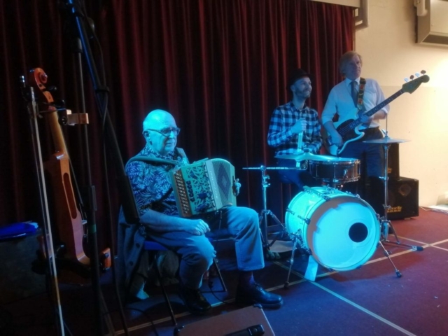 the ceilidh band ready to play at a primary school social evening